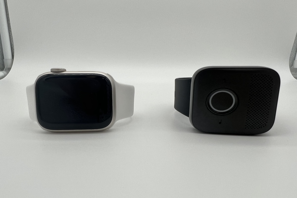 Apple Watch and MGMini Lite medical alert bracelet device shown side by side 
